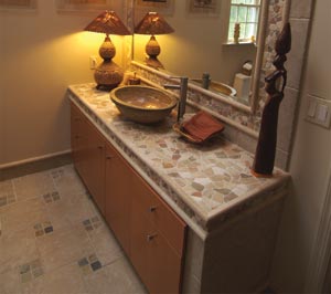 Countertop made from Mega mix pebbles and beige, tan and molten marbles